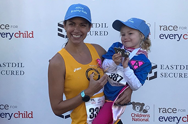 Avery and her mom after a race
