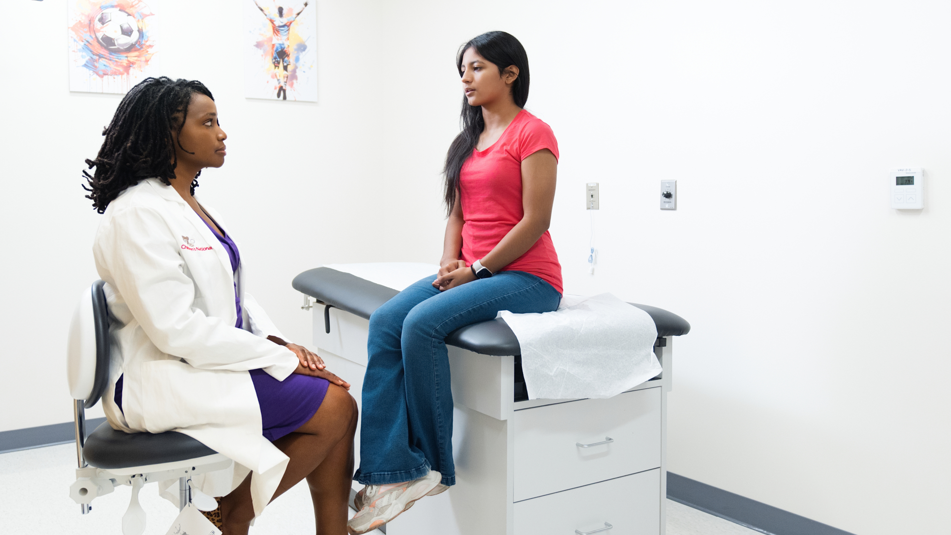 Doctor consultation with teen girl