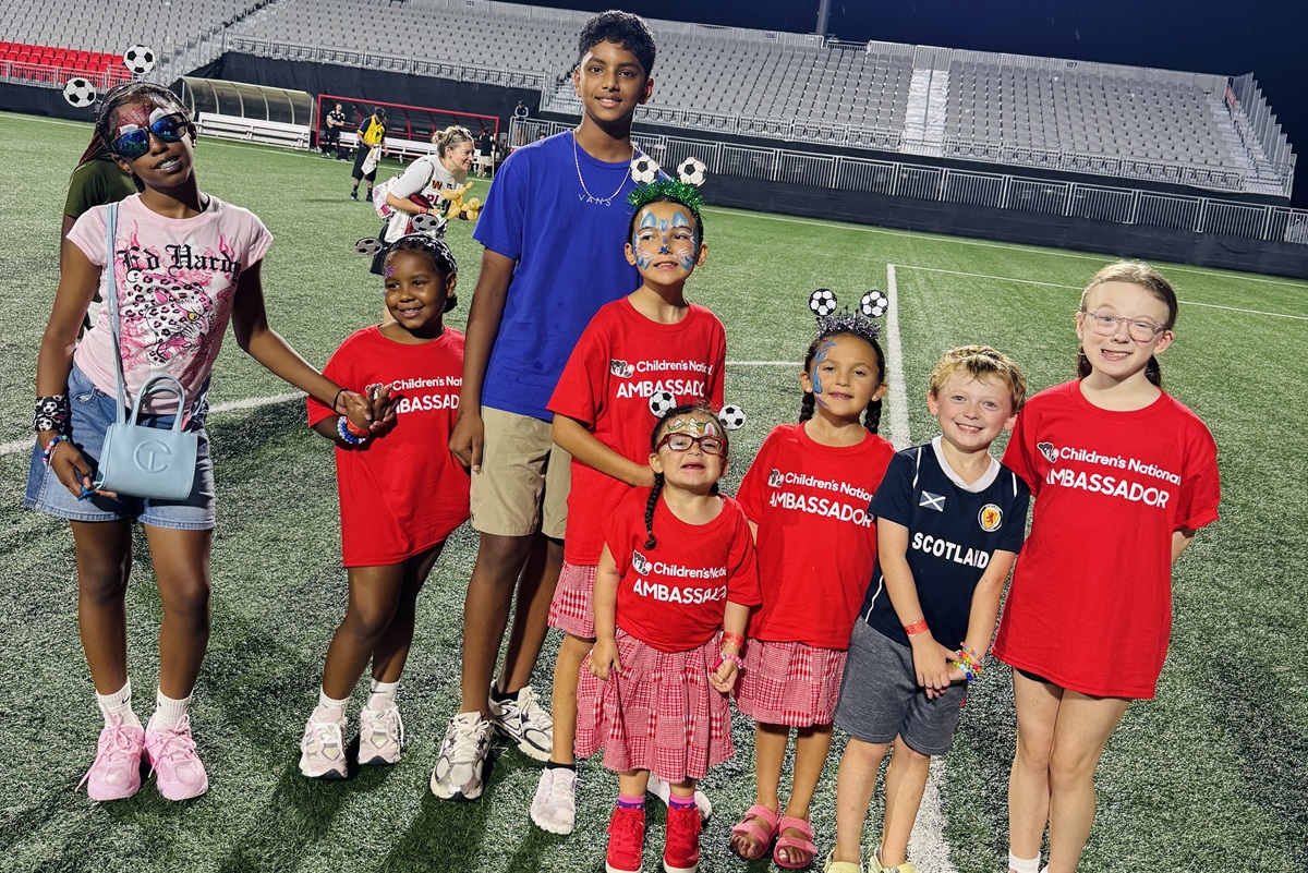 Children's National patient ambassadors on Loudoun United FC field.
