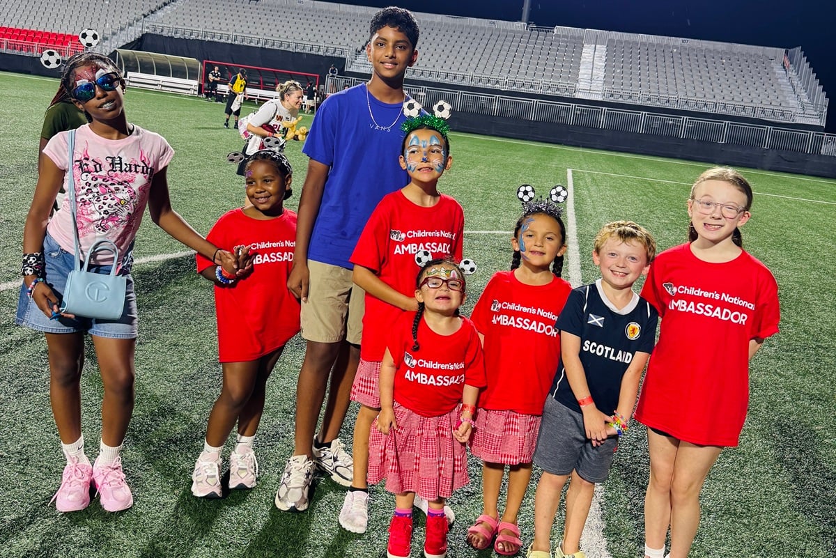Children's National patient ambassadors on Loudoun United FC field.