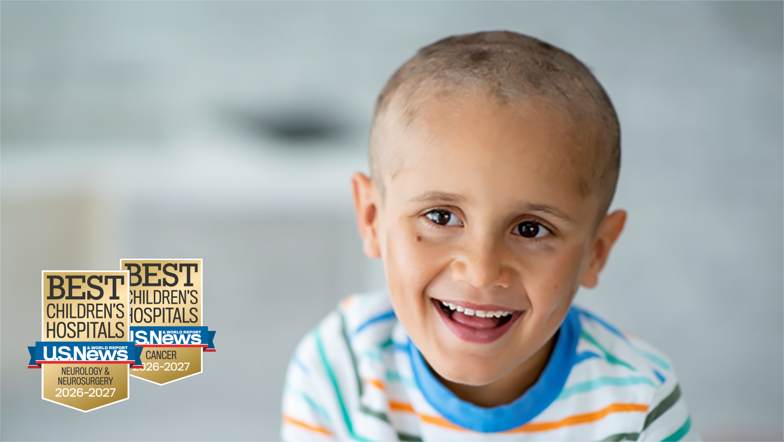 smiling young boy with cancer