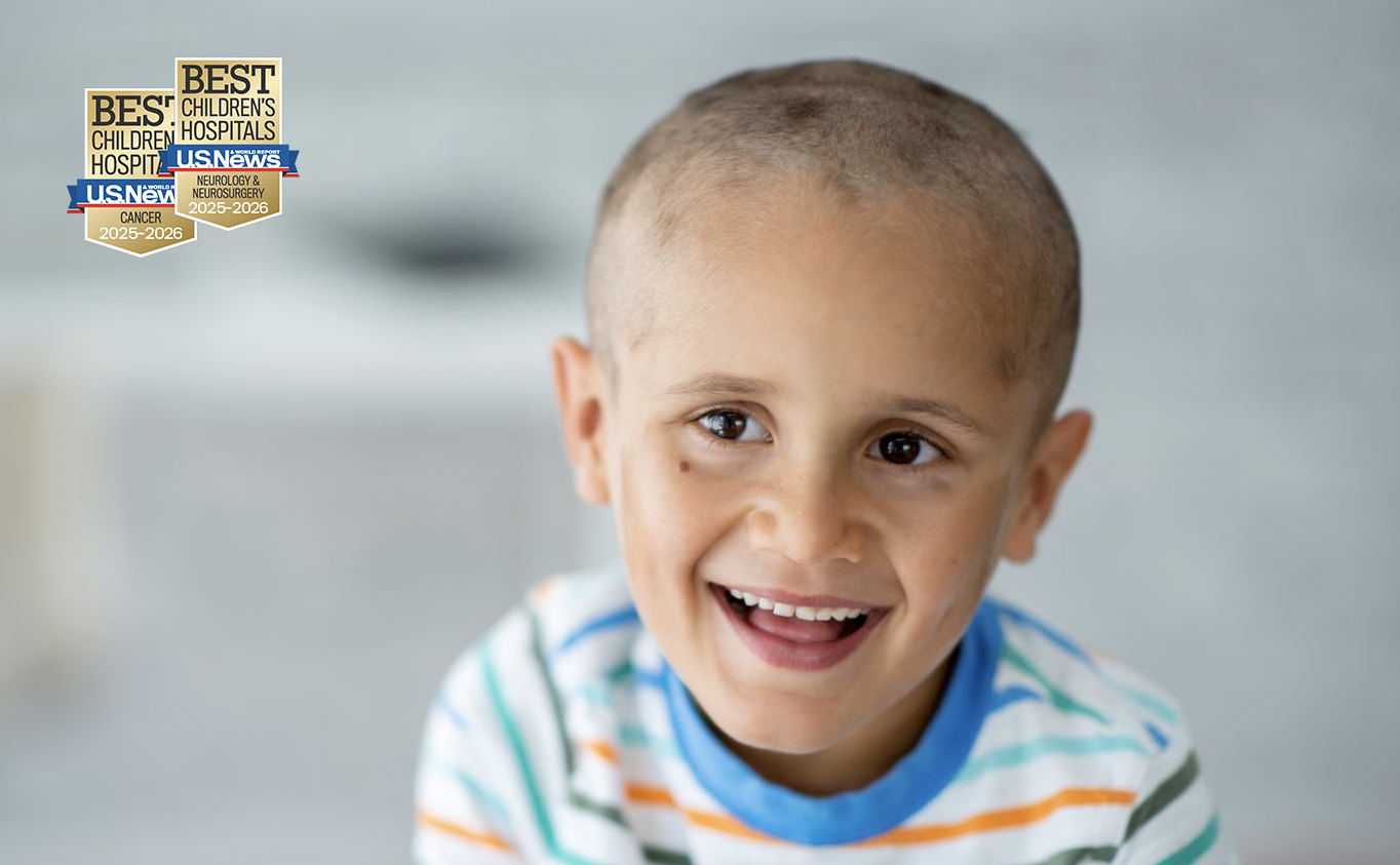 smiling young boy with cancer