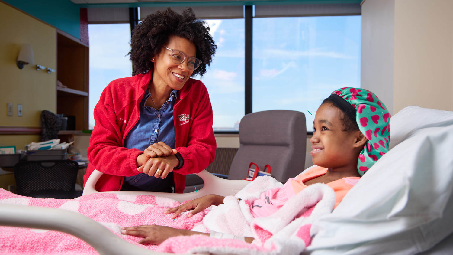 Dr. Risi Idiokitas treats a patient with sickle cell disease