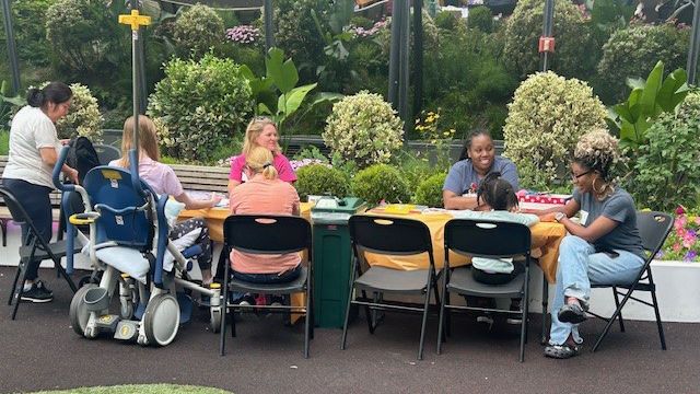 Patients in the bunny melon garden doing arts and crafts