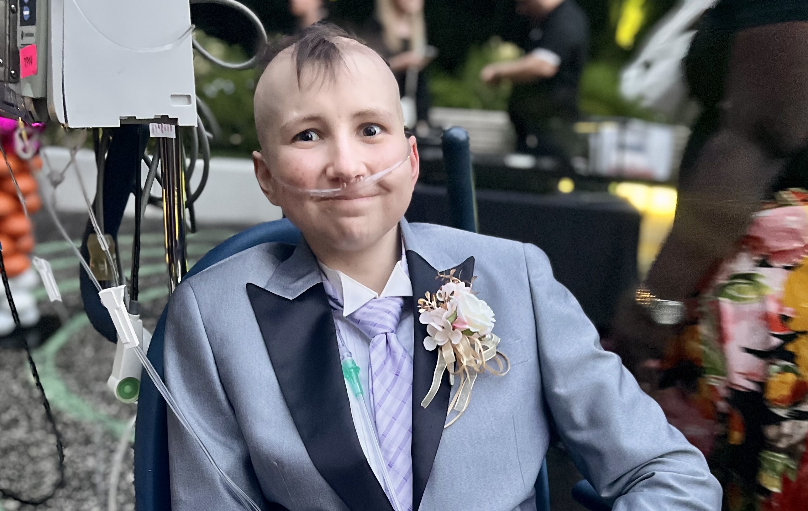 Jimmy wearing a suit while attending Dunkin' Prom.