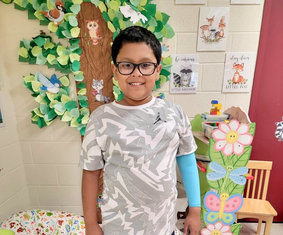 Josiah wearing cast
