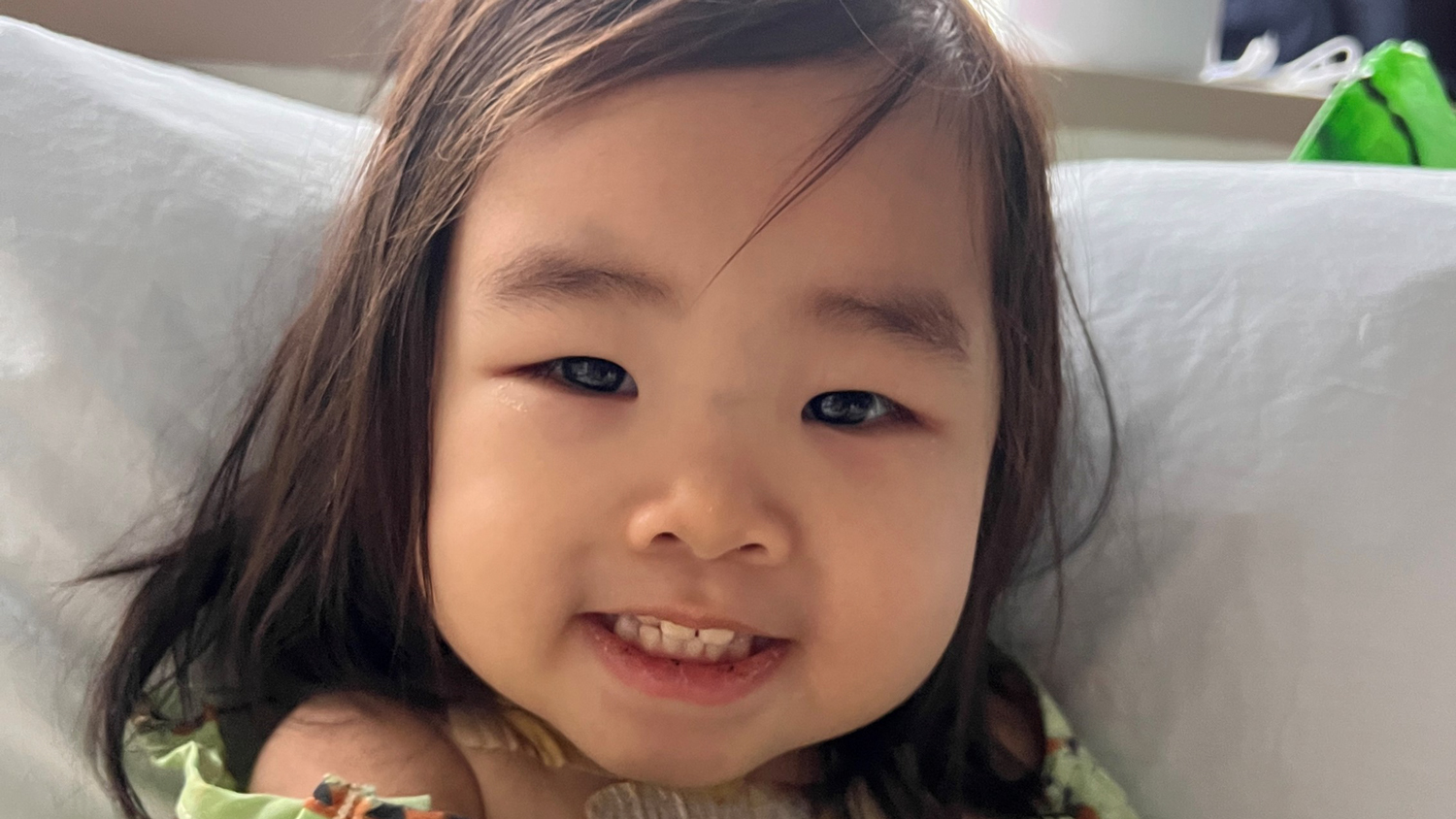 CNH patient, Mikaela, smiling.