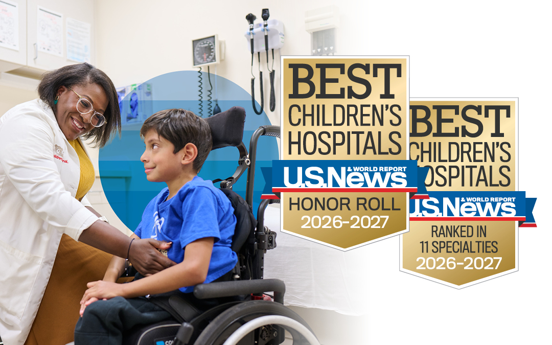 doctor examining young boy. US News award badges